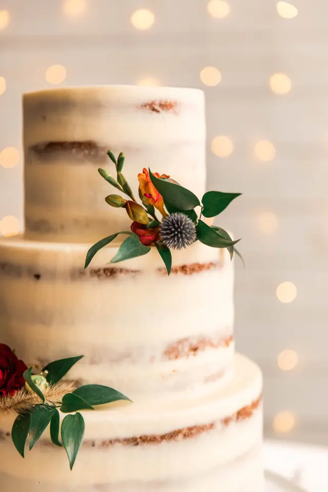 Semi-naked cake decorated with autumn flowers